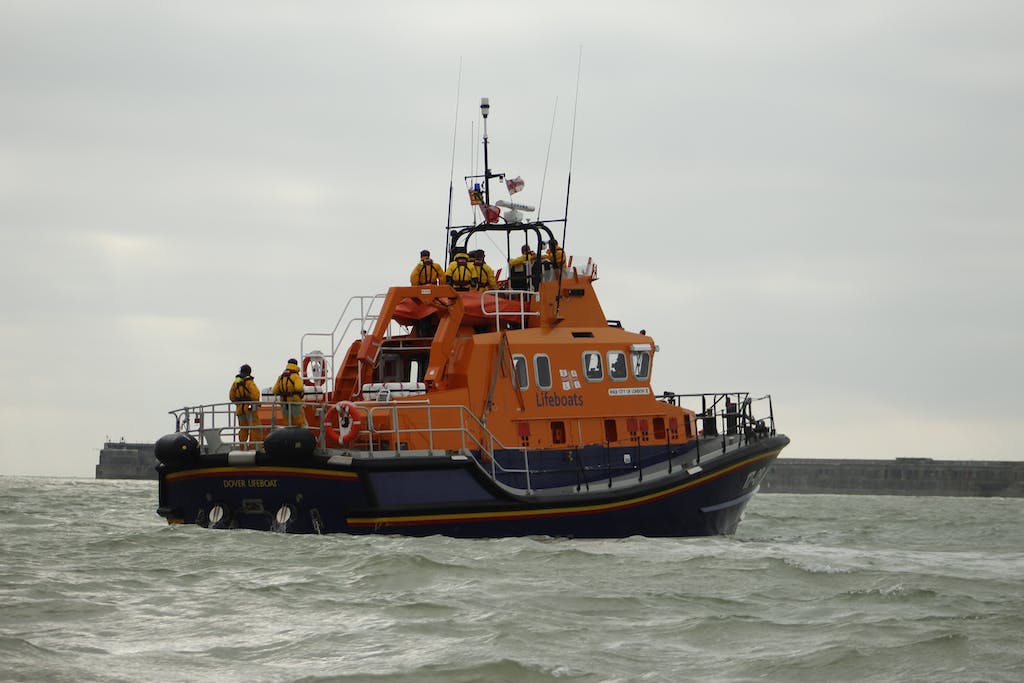 Orange Lifeboat on Water